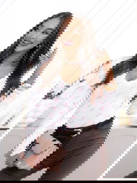 Pudrowa bluzka w serduszka...