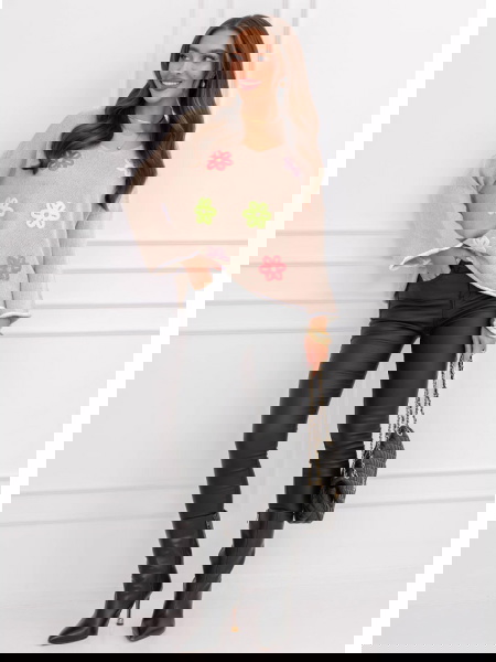 Beżowy sweter z ozdobnymi...