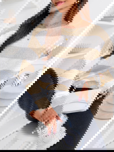 Beżowy sweter w paski...