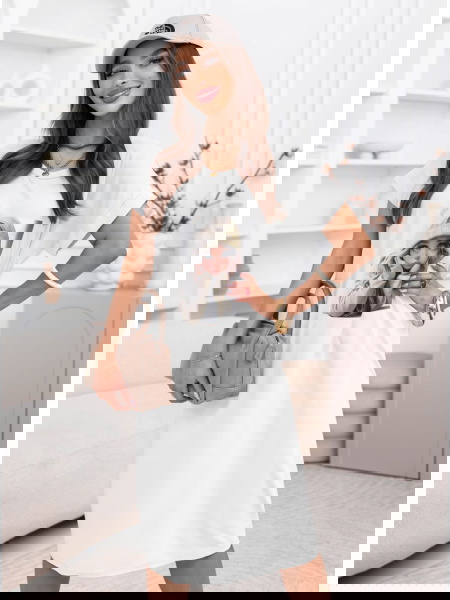 Biała sukienka z ozdobnym...