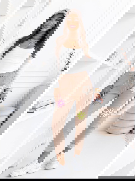 Jasnobeżowe spodnie z...