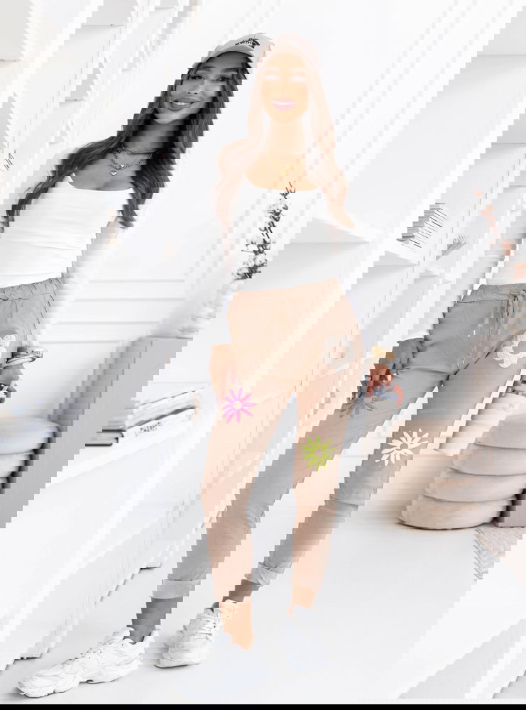 Jasnobeżowe spodnie z ozdobnymi...