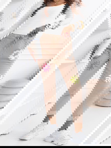 Jasnobeżowe spodnie z... 2