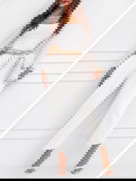 Białe spodnie z ozdobnym...