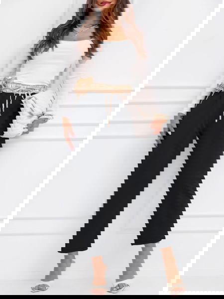 Czarne spodnie z ozdobnym... 2