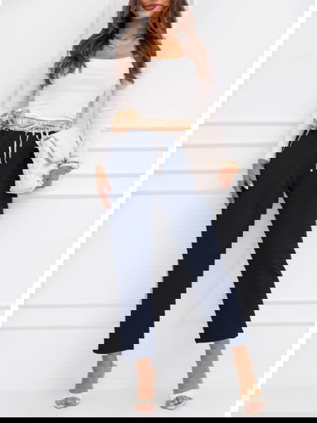 Granatowe spodnie z...