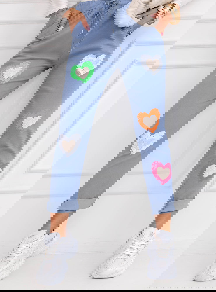 Niebieskie spodnie z ozdobnymi...