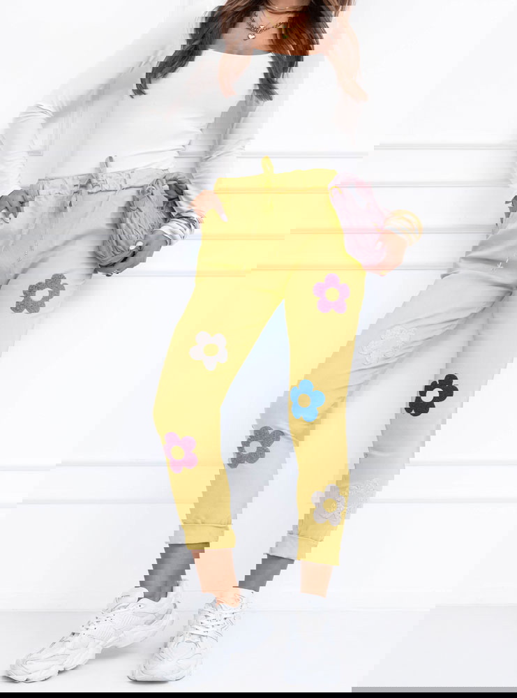 Spodnie z ozdobnymi kwiatkami Nedivaa...