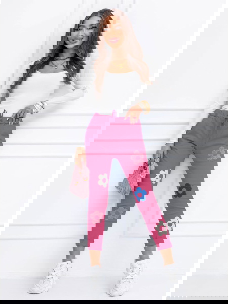 Różowe spodnie z ozdobnymi...