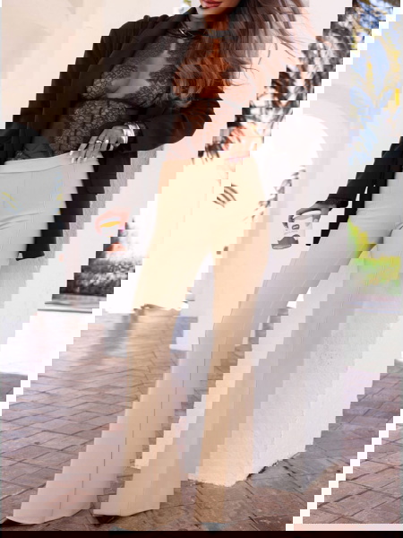 Beżowe spodnie z szerokimi... 2