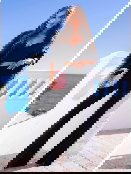 Czarne spodnie z szerokimi...