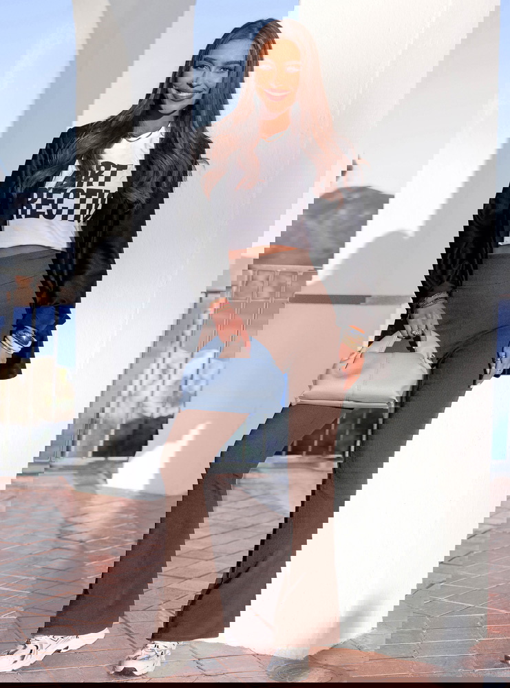 Prążkowane spodnie z rozszerzanymi...