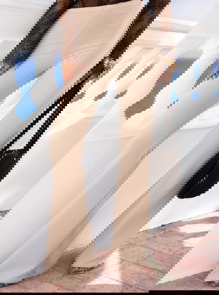 Beżowe spodnie z wysokim stanem i...