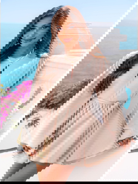 Jasnobeżowy kombinezon jak... 2