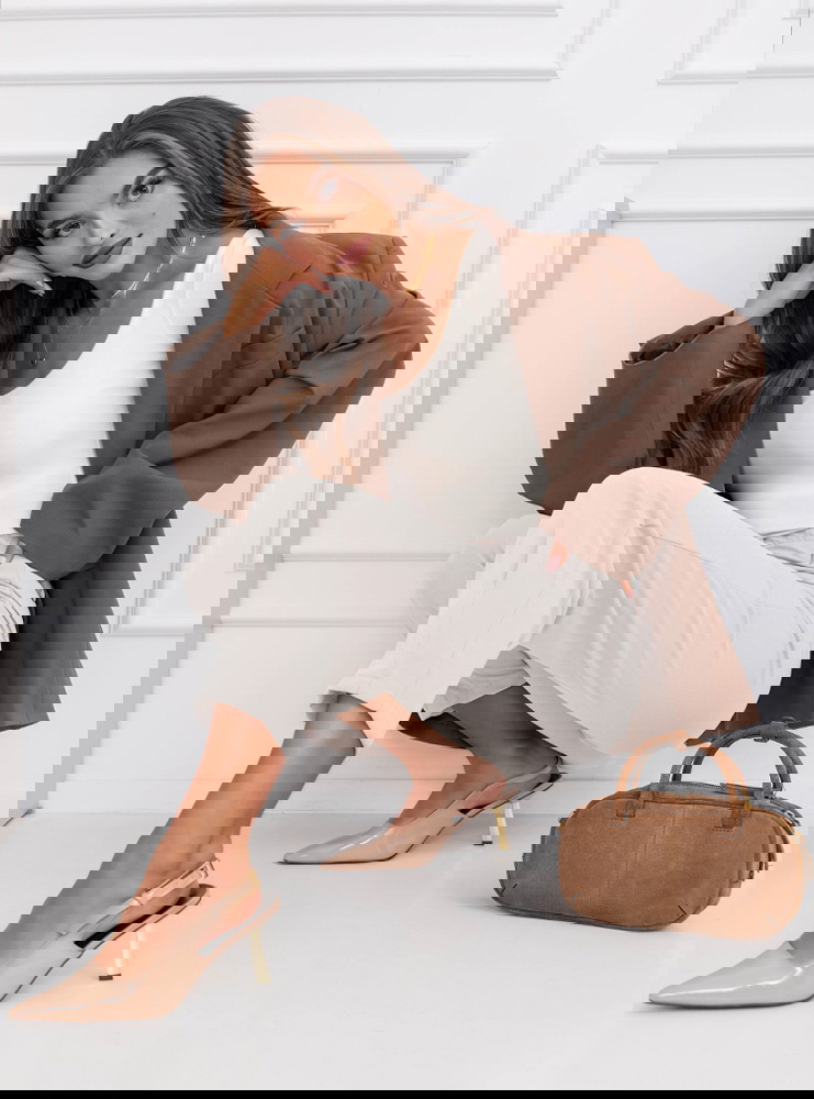 Białe spodnie z kieszeniami Riverria