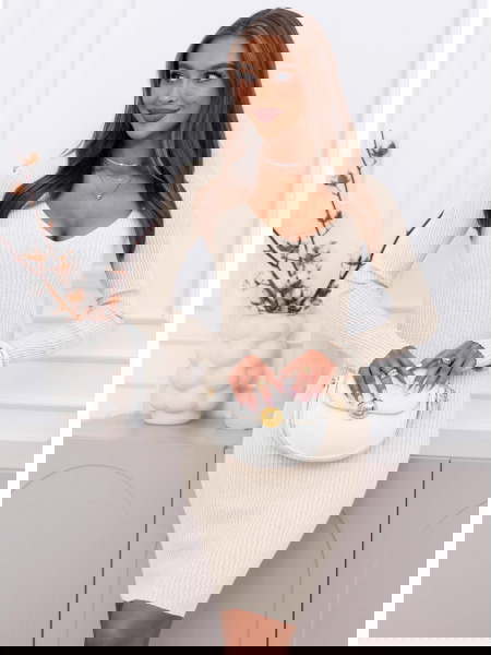 Beżowa prążkowana sukienka...