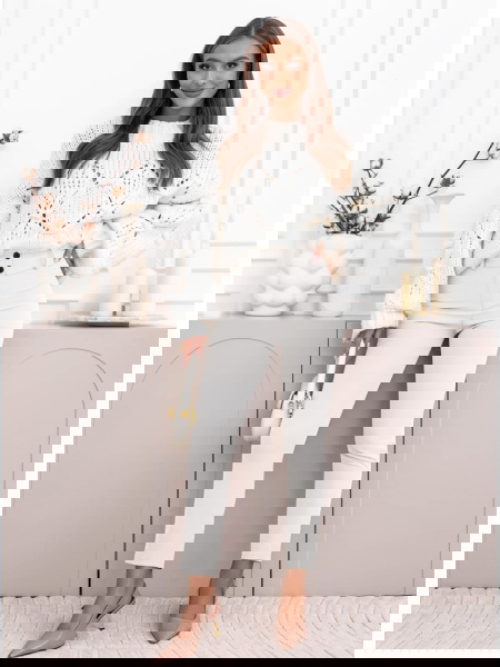 Białe spodnie zapinane na... 2