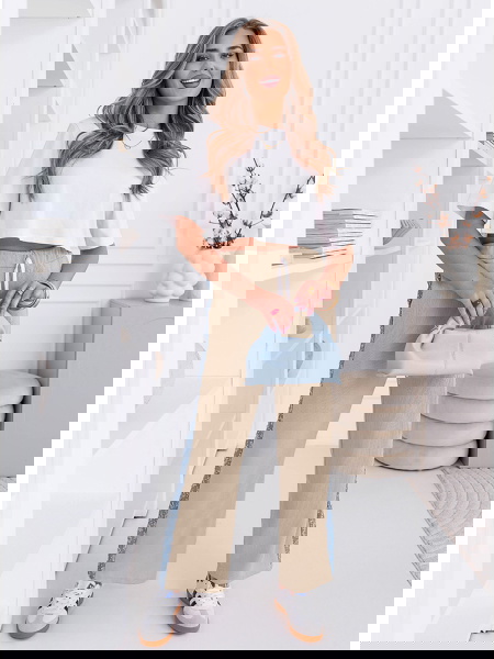 Beżowe spodnie z ozdobnymi...