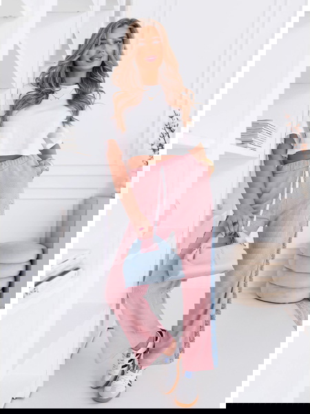 Pudrowe spodnie z ozdobnymi...