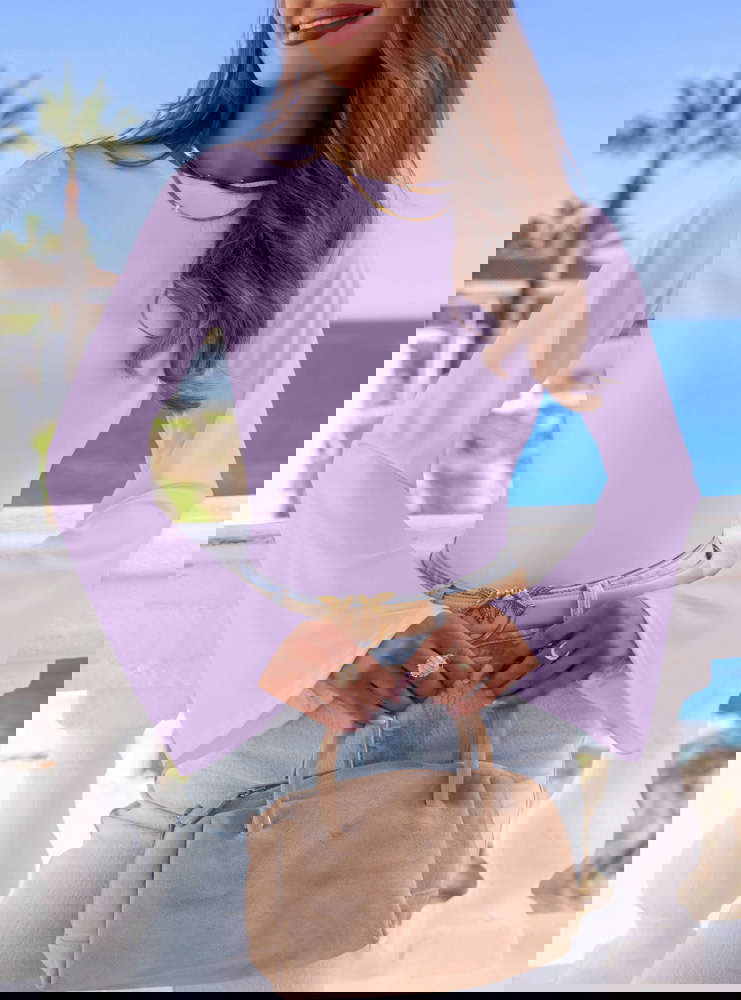 Liliowa bluzka z szerokimi rękawami...