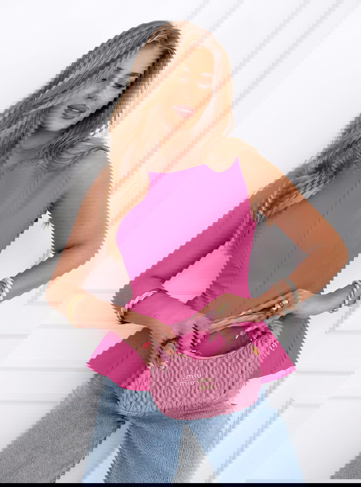 Dopasowana bluzka z rozkloszowanym...