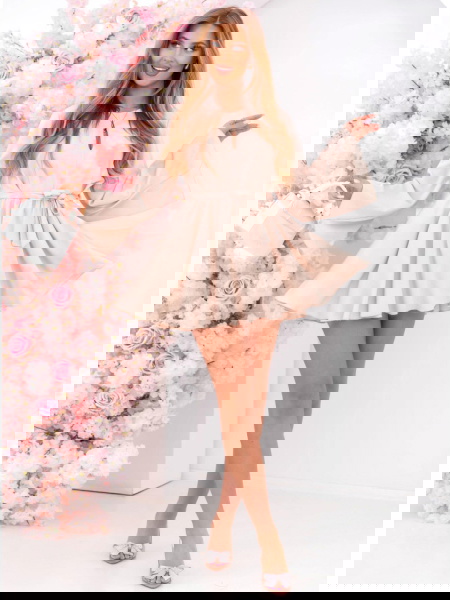 Jasnobeżowy kombinezon jak... 2