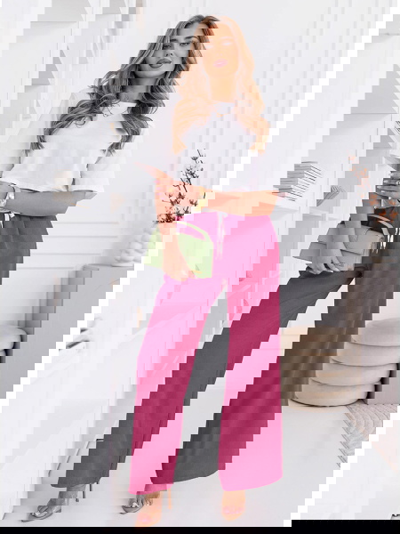 Różowe szerokie spodnie z...