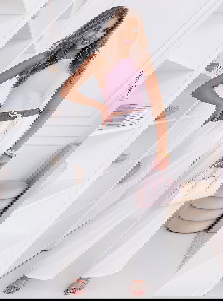 Białe szerokie spodnie z ozdobnym...