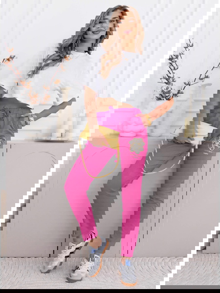 Różowe spodnie z ozdobnym...