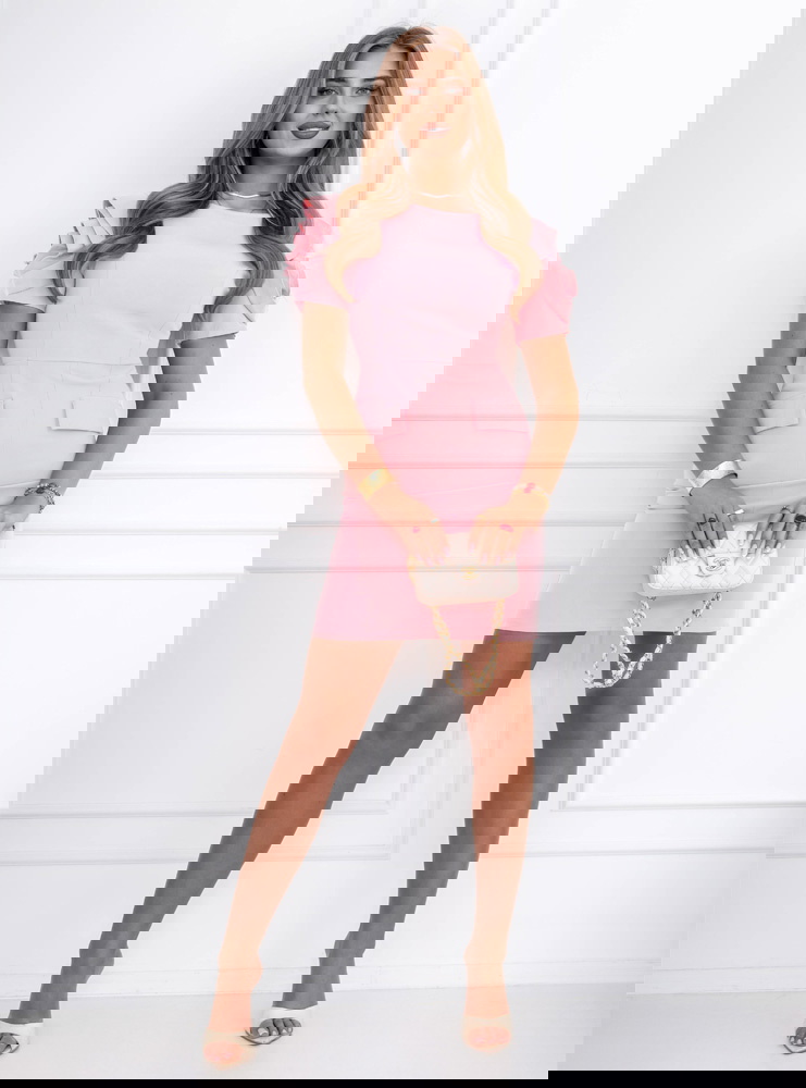 Pudrowa dopasowana sukienka mini...