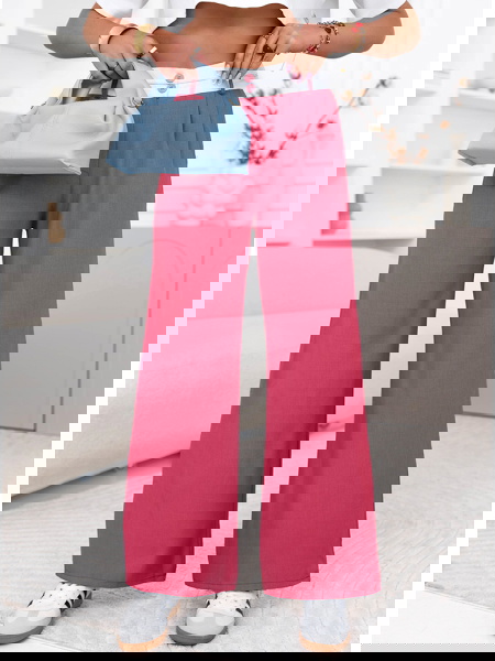 Różowe szerokie spodnie z...