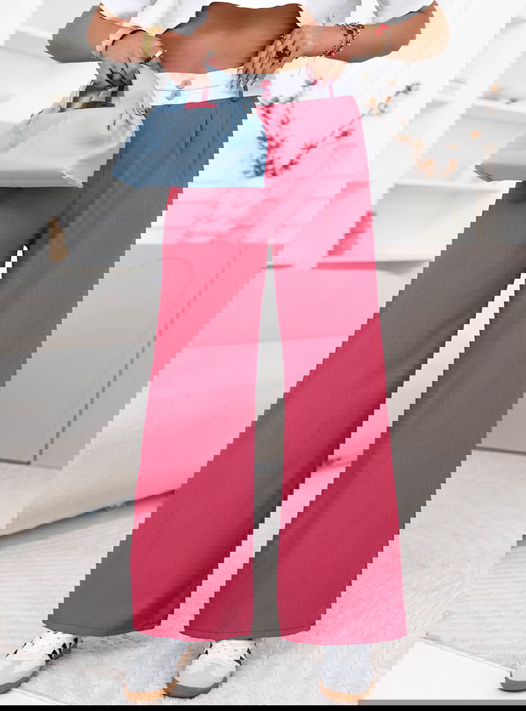 Różowe szerokie spodnie z kieszeniami...