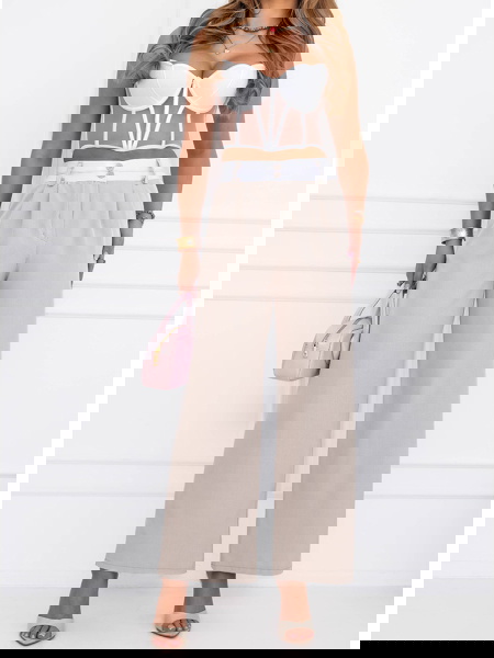 Beżowe szerokie spodnie z...