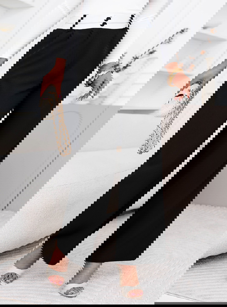 Czarne szerokie spodnie z kieszeniami...