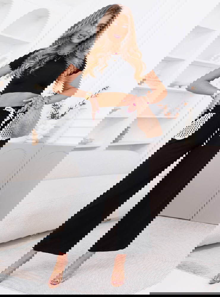 Czarne szerokie spodnie z kieszeniami...