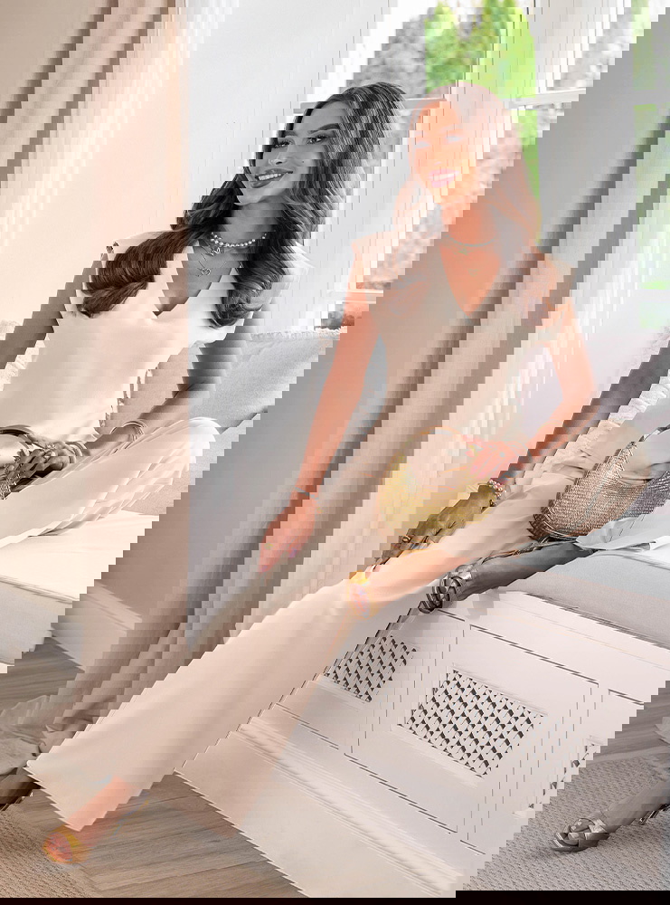 Jasnobeżowy komplet bluzka z dekoltem...