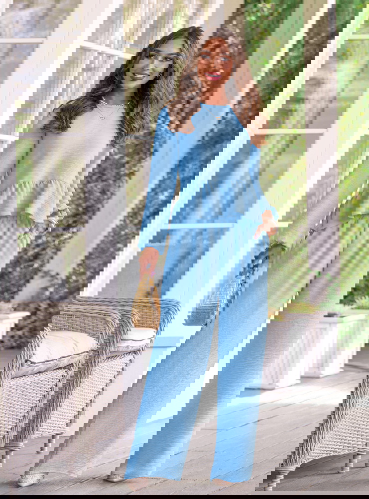 Błękitny komplet bluzka z falbanką i...