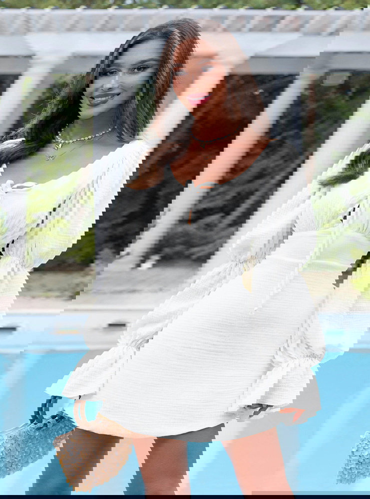 Biała muślinowa sukienka z wiązaniem...