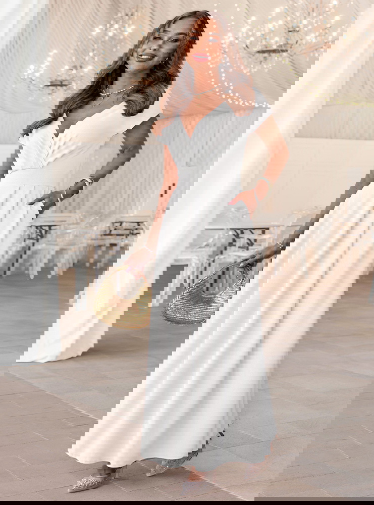 Biała sukienka maxi z przekładanym...