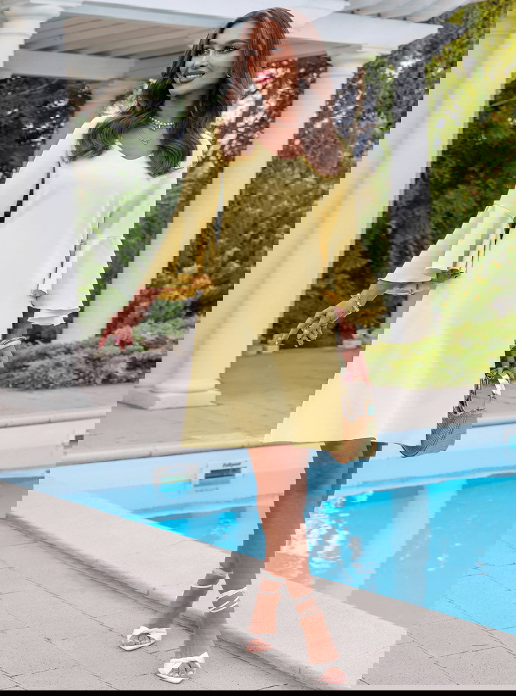 Trapezowa sukienka z rozszerzanymi...