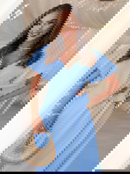 Błękitna sukienka z... 2