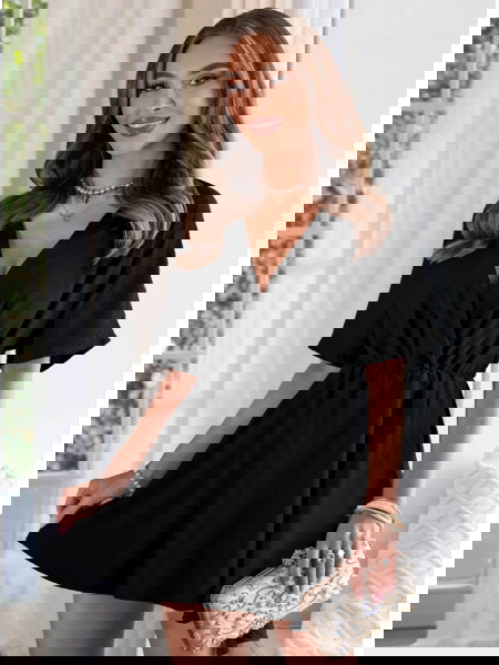 Czarny kombinezon jak...