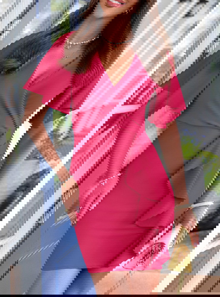 Sukienka z przekładanym dekoltem...