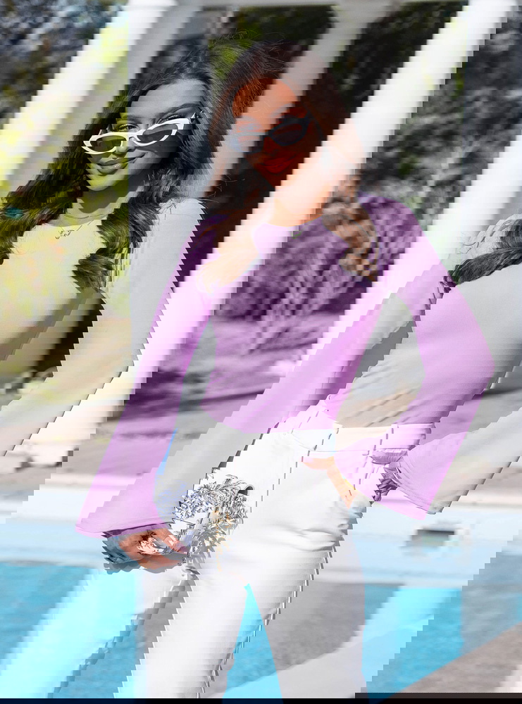 Liliowa bluzka z szerokimi rękawami...